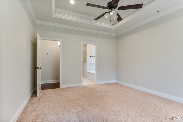 79 Birchwood Ln, Wetumpka, AL 36093 - unfurnished bedroom with ornamental molding, carpet, a tray ceiling, and ensuite bath