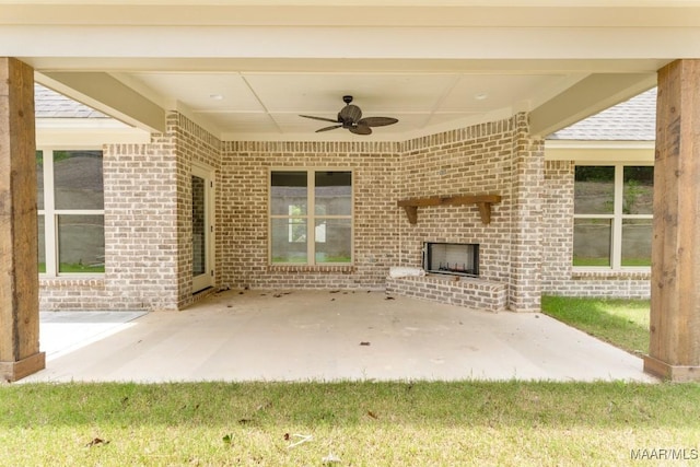 79 Birchwood Ln, Wetumpka, AL 36093 - view of patio featuring an outdoor brick fireplace and a ceiling fan