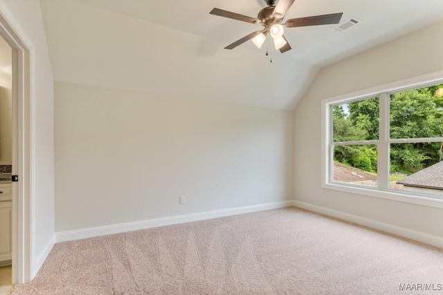 79 Birchwood Ln, Wetumpka, AL 36093 - spare room featuring light carpet, lofted ceiling, and ceiling fan