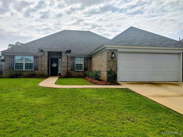 512 Lismore Pl, Montgomery, AL 36117 - single story home featuring concrete driveway, a front lawn, an attached garage, and brick siding