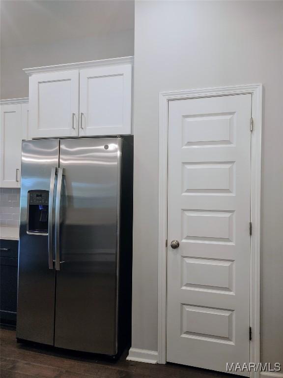 512 Lismore Pl, Montgomery, AL 36117 - kitchen with stainless steel fridge with ice dispenser, white cabinets, dark wood finished floors, light countertops, and backsplash