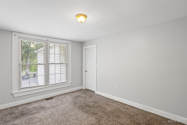 1310 Woodward Ave, Montgomery, AL 36106 - carpeted empty room with baseboards