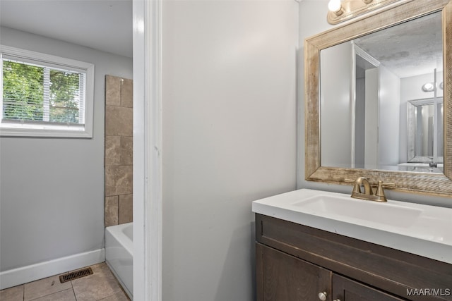 1310 Woodward Ave, Montgomery, AL 36106 - full bath featuring vanity and tile patterned flooring