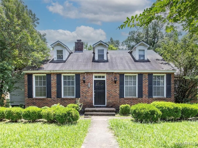 1310 Woodward Ave, Montgomery, AL 36106 - cape cod home with brick siding and a chimney