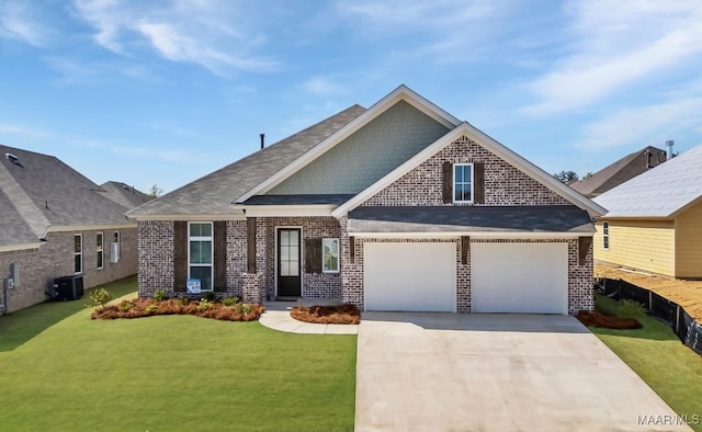 646 Cotton Terrace Loop, Deatsville, AL 36022 - craftsman-style home with brick siding, a front lawn, concrete driveway, and an attached garage