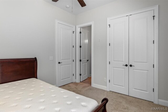 8465 Melbourne Cir, Montgomery, AL 36117 - carpeted bedroom featuring a closet and a ceiling fan