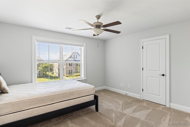 8465 Melbourne Cir, Montgomery, AL 36117 - carpeted bedroom with baseboards and a ceiling fan