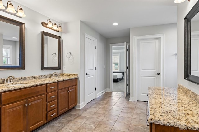 8465 Melbourne Cir, Montgomery, AL 36117 - ensuite bathroom featuring double vanity and recessed lighting