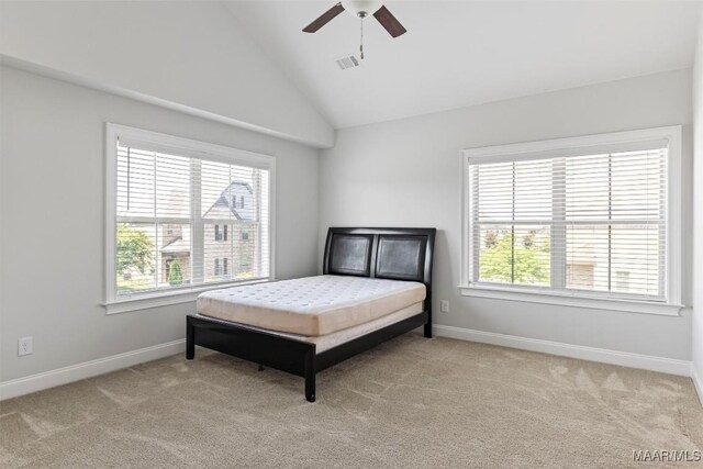 8465 Melbourne Cir, Montgomery, AL 36117 - bedroom with carpet floors, vaulted ceiling, and a ceiling fan