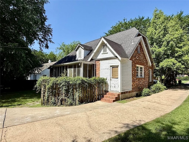 3319 Lexington Rd, Montgomery, AL 36106 - view of front facade with brick siding, entry steps, and a shingled roof
