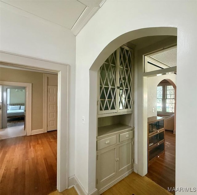 3319 Lexington Rd, Montgomery, AL 36106 - hall featuring wood finished floors, ornamental molding, and arched walkways