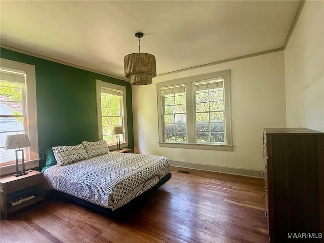 3319 Lexington Rd, Montgomery, AL 36106 - bedroom featuring hardwood / wood-style flooring and crown molding