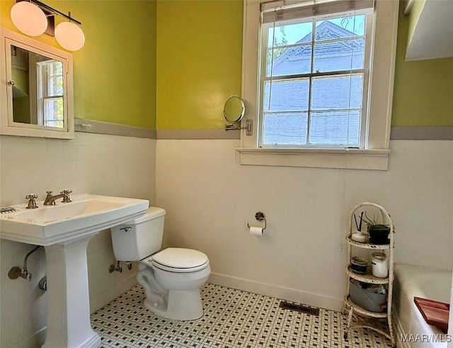 3319 Lexington Rd, Montgomery, AL 36106 - full bathroom with plenty of natural light and a bathtub