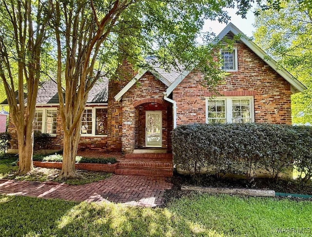 3319 Lexington Rd, Montgomery, AL 36106 - english style home featuring brick siding and roof with shingles