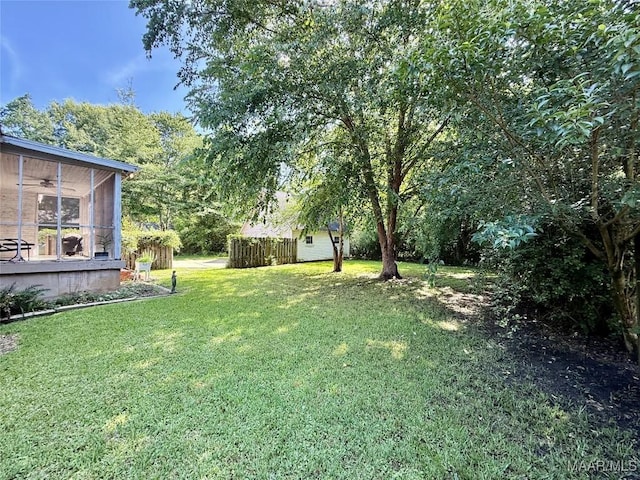 3319 Lexington Rd, Montgomery, AL 36106 - view of grassy yard with a sunroom and a ceiling fan