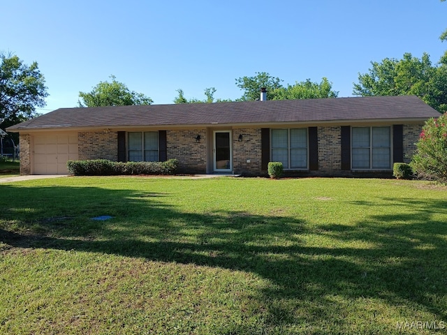 508 Columbus Dr, Selma, AL 36701 - ranch-style house featuring a garage, brick siding, and a front lawn