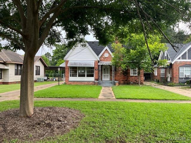 158 S Madison Ter, Montgomery, AL 36107 - view of front of home featuring brick siding and a front lawn
