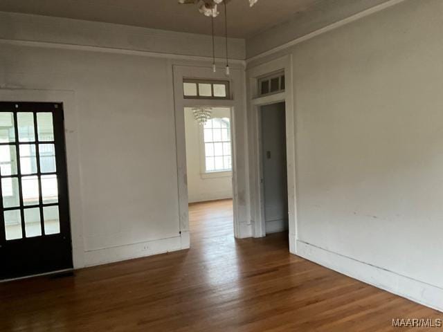 158 S Madison Ter, Montgomery, AL 36107 - unfurnished dining area featuring wood finished floors and plenty of natural light