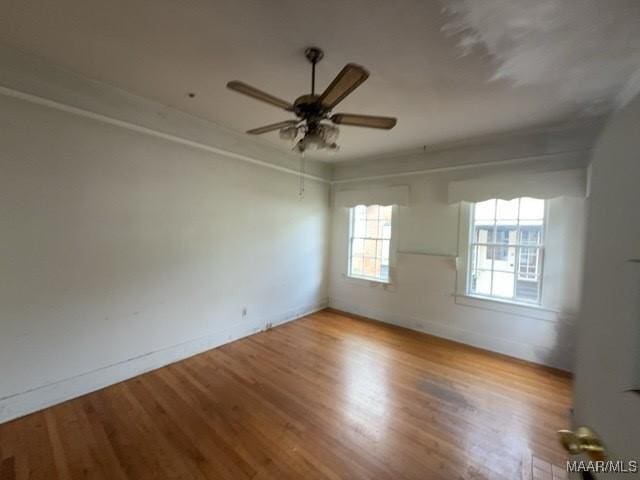 158 S Madison Ter, Montgomery, AL 36107 - unfurnished room with wood finished floors and a ceiling fan