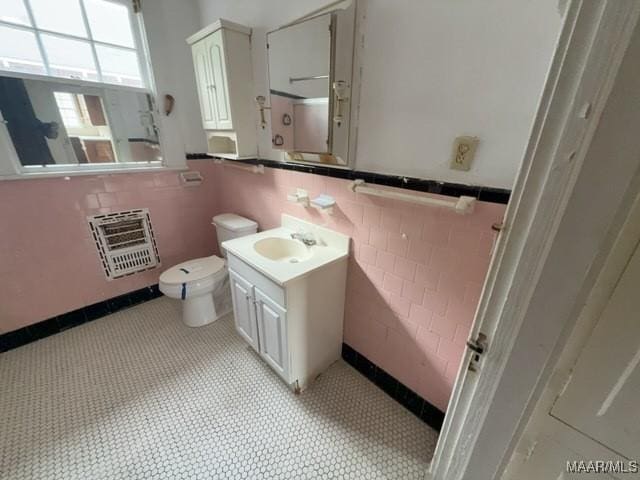 158 S Madison Ter, Montgomery, AL 36107 - bathroom with heating unit and vanity