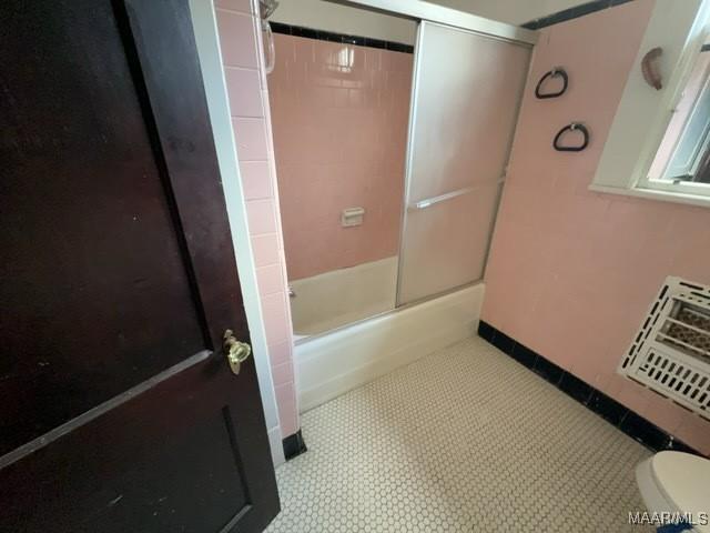 158 S Madison Ter, Montgomery, AL 36107 - bathroom featuring toilet and shower / tub combination