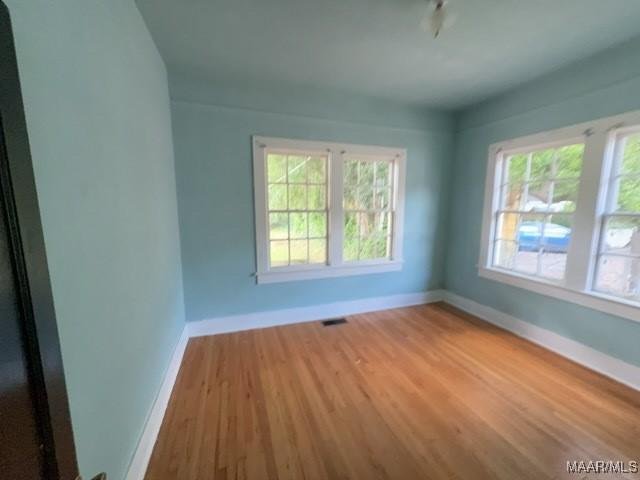 158 S Madison Ter, Montgomery, AL 36107 - empty room featuring baseboards and wood finished floors