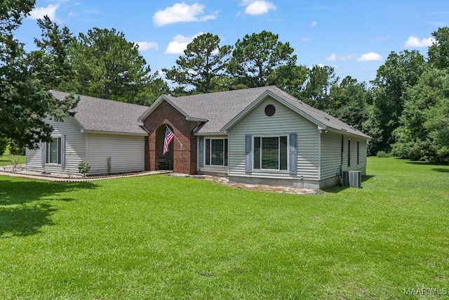 165 Ten Cedars Dr, Titus, AL 36080 - ranch-style home with a front lawn and a shingled roof