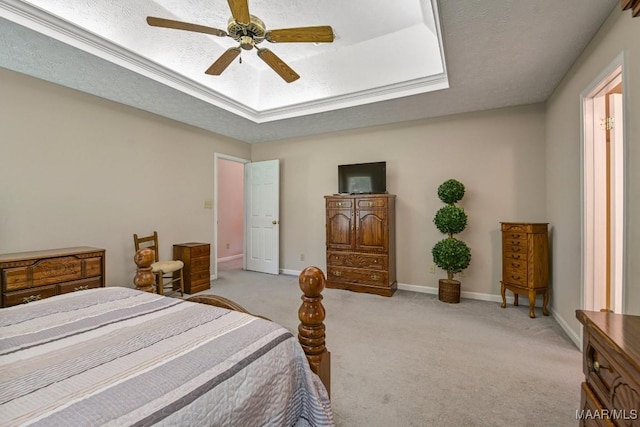 165 Ten Cedars Dr, Titus, AL 36080 - bedroom with light colored carpet, a tray ceiling, and ceiling fan