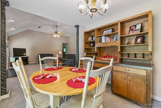 165 Ten Cedars Dr, Titus, AL 36080 - dining area featuring light colored carpet, ceiling fan, a chandelier, and lofted ceiling