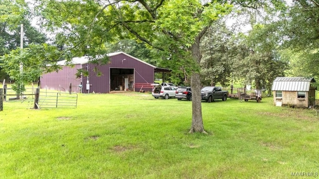 1352 Gibson Rd, Greenville, AL 36037 - view of yard featuring an outbuilding, a pole building, and a detached garage