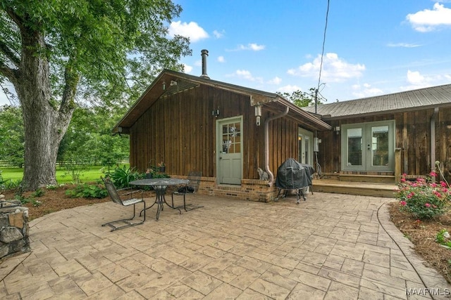 1352 Gibson Rd, Greenville, AL 36037 - view of patio featuring french doors, area for grilling, and entry steps