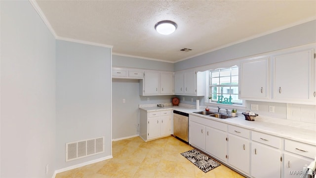 461 Glade Park Dr, Montgomery, AL 36109 - kitchen with dishwasher, crown molding, a textured ceiling, white cabinetry, and light countertops