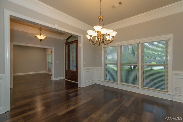 7025 Wynlakes Blvd, Montgomery, AL 36117 - unfurnished room with a chandelier, crown molding, dark wood-style flooring, a wainscoted wall, and a decorative wall