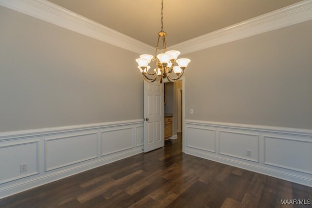7025 Wynlakes Blvd, Montgomery, AL 36117 - empty room featuring a chandelier, crown molding, dark wood-type flooring, a wainscoted wall, and a decorative wall