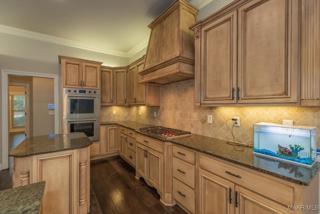 7025 Wynlakes Blvd, Montgomery, AL 36117 - kitchen featuring stainless steel appliances, dark stone countertops, dark wood-type flooring, backsplash, and crown molding