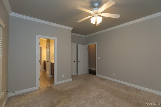 7025 Wynlakes Blvd, Montgomery, AL 36117 - unfurnished bedroom with crown molding, light colored carpet, ensuite bathroom, and ceiling fan