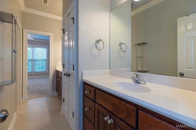7025 Wynlakes Blvd, Montgomery, AL 36117 - bathroom featuring ornamental molding, vanity, and tile patterned floors