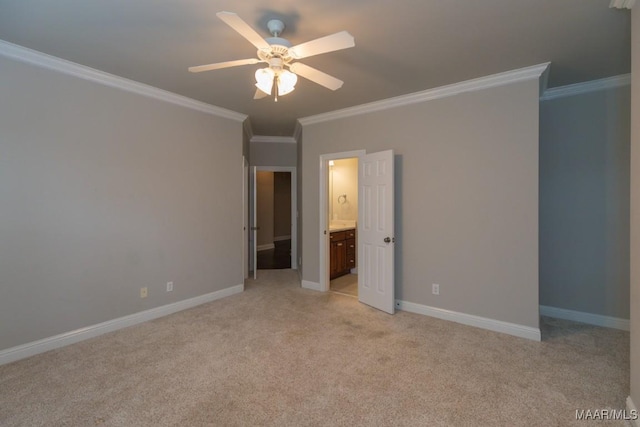7025 Wynlakes Blvd, Montgomery, AL 36117 - unfurnished bedroom featuring crown molding, light colored carpet, connected bathroom, and a ceiling fan