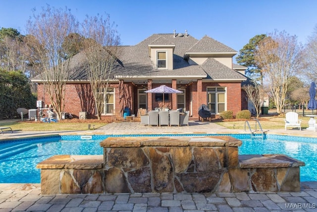 7025 Wynlakes Blvd, Montgomery, AL 36117 - swimming pool with a patio area