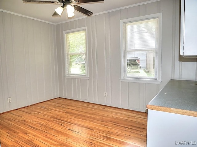 3609 Loxley Ln, Montgomery, AL 36109 - unfurnished dining area with light wood-type flooring, ornamental molding, and ceiling fan
