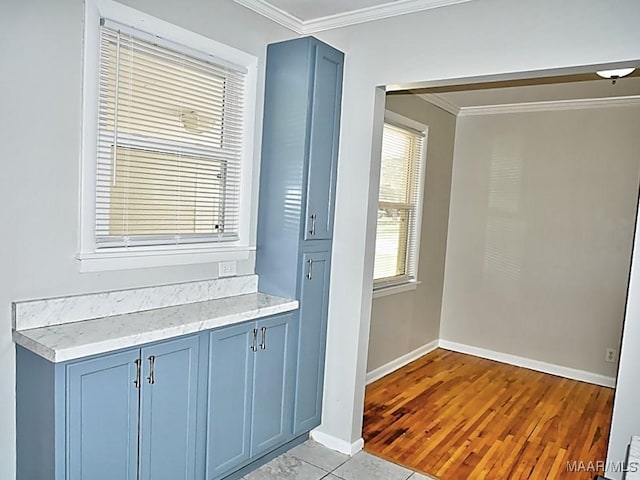 3609 Loxley Ln, Montgomery, AL 36109 - bar with crown molding and light tile patterned floors