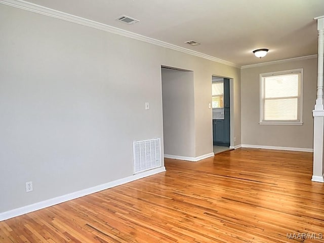 3609 Loxley Ln, Montgomery, AL 36109 - empty room with ornamental molding and light wood-style floors