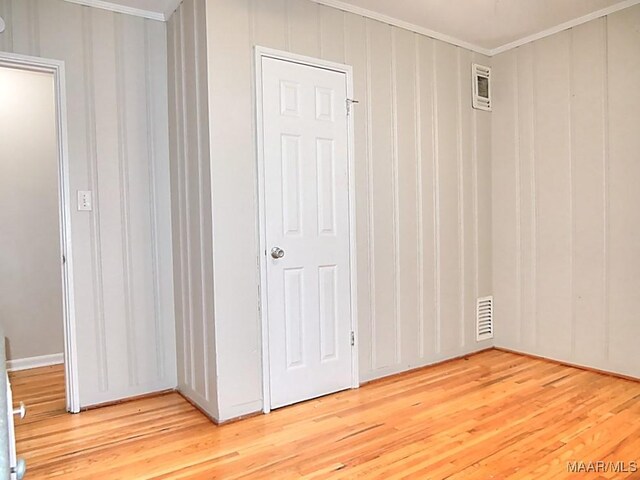 3609 Loxley Ln, Montgomery, AL 36109 - unfurnished room with ornamental molding and light wood finished floors