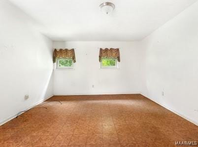 1219 First Ave, Tuskegee, AL 36088 - spare room with healthy amount of natural light