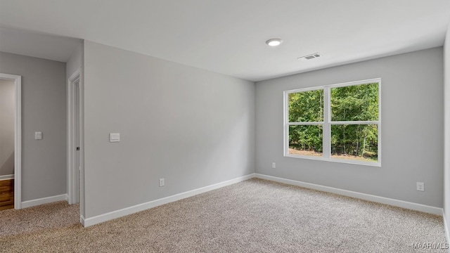 6013 Cunningham Trl, Montgomery, AL 36116 - spare room featuring carpet flooring and baseboards
