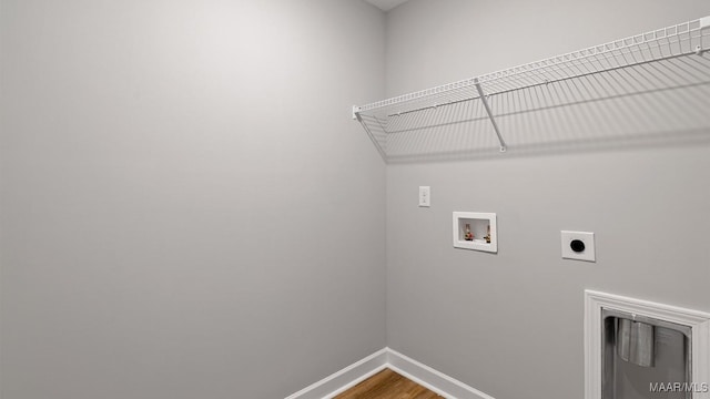 6013 Cunningham Trl, Montgomery, AL 36116 - washroom featuring electric dryer hookup, washer hookup, and wood finished floors