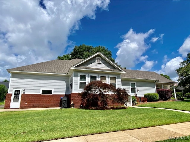 1210 Sadie Cir, Prattville, AL 36066 - view of front of house with brick siding, a front lawn, and roof with shingles