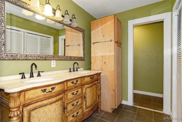 1245 Providence Rd, Titus, AL 36080 - full bath with double vanity, tile patterned floors, and a closet