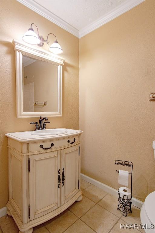 1245 Providence Rd, Titus, AL 36080 - bathroom featuring ornamental molding, vanity, and tile patterned flooring