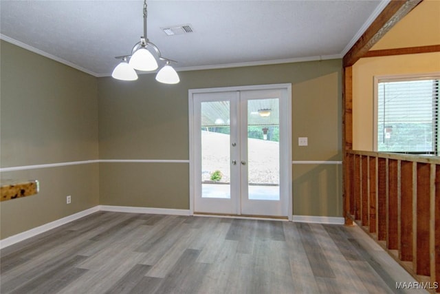 1245 Providence Rd, Titus, AL 36080 - unfurnished dining area with wood finished floors, french doors, and crown molding